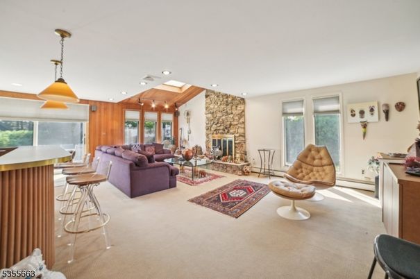 Fireplace, Interior, Living room, Pendant Lights, Recessed Lighting, Stone Walls, Wooden Ceilings