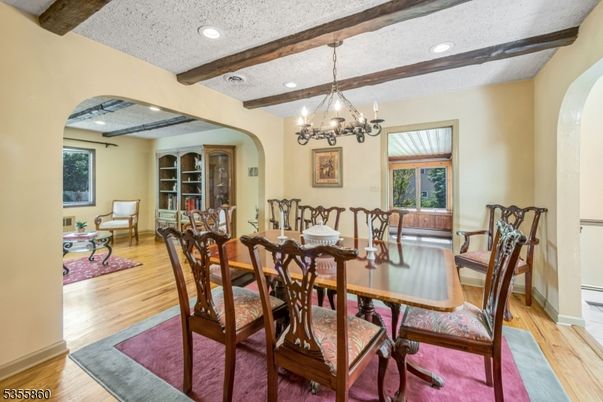 Chandelier, Dining room, Interior, Recessed Lighting, Wooden Beams, Wood Texture Flooring