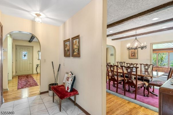 Chandelier, Dining room, Interior, Recessed Lighting, Wooden Beams, Wood Texture Flooring