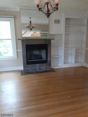 Chandelier, Fireplace, Interior, Wood Texture Flooring