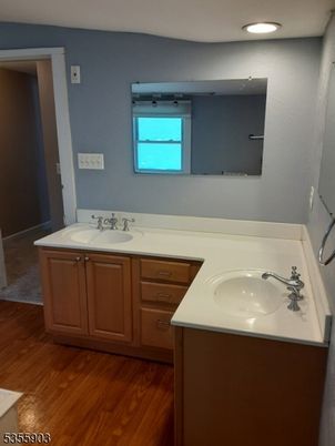 Bathroom, Dual Sink Vanities, Interior, Recessed Lighting, Wood Texture Flooring