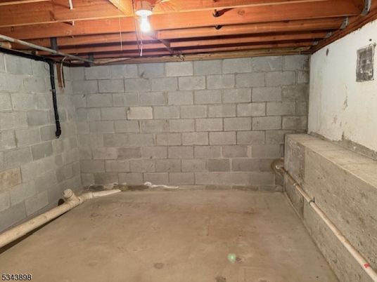 Garage, Interior, Stone Walls, Wooden Beams