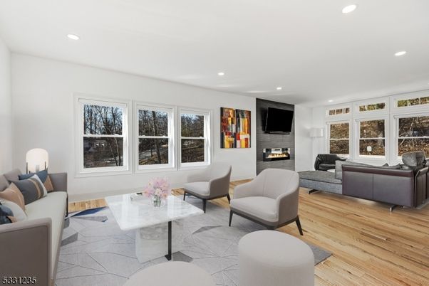 Fireplace, Interior, Living room, Recessed Lighting, Wood Texture Flooring