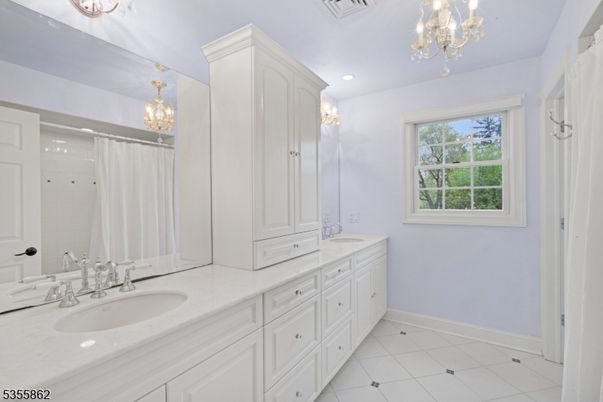 Bathroom, Chandelier, Dual Sink Vanities, Interior, Recessed Lighting