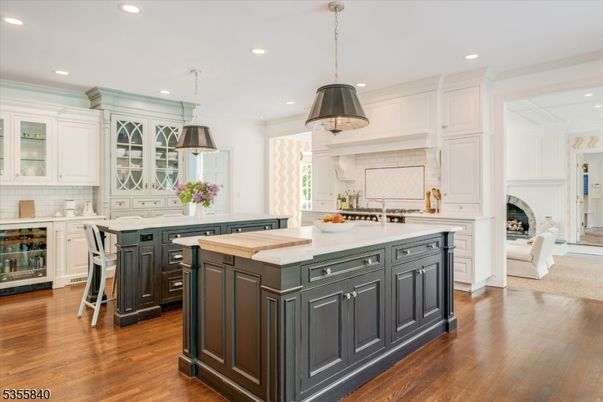 Fireplace, Interior, Kitchen, Pendant Lights, Recessed Lighting, Stainless Steel Appliances, Wood Texture Flooring