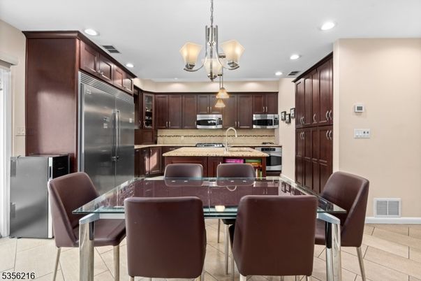 Dining room, Interior, Kitchen, Pendant Lights, Recessed Lighting, Stainless Steel Appliances