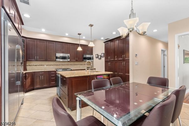 Dining room, Interior, Kitchen, Pendant Lights, Recessed Lighting, Stainless Steel Appliances