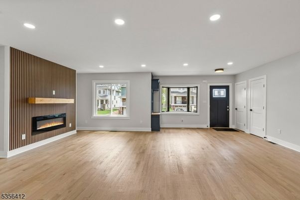 Empty room, Fireplace, Interior, Recessed Lighting, Wood Texture Flooring