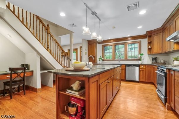 Interior, Kitchen, Pendant Lights, Recessed Lighting, Stainless Steel Appliances, Wood Texture Flooring