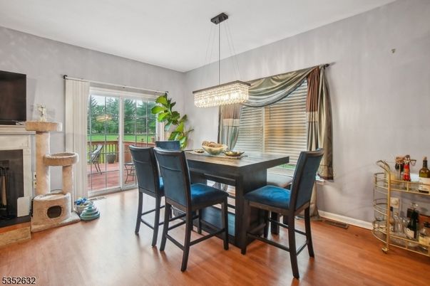 Chandelier, Dining room, Fireplace, Interior, Wood Texture Flooring