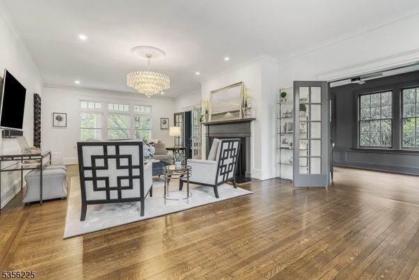 Chandelier, Fireplace, Interior, Living room, Recessed Lighting, Wood Texture Flooring