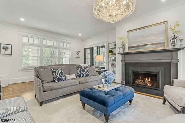 Chandelier, Fireplace, Interior, Living room, Recessed Lighting, Wood Texture Flooring