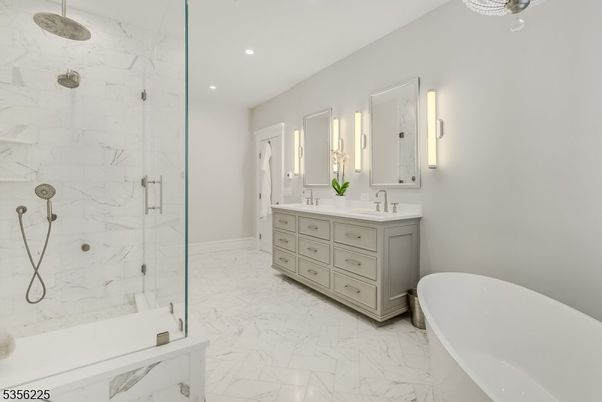 Bathroom, Dual Sink Vanities, Free Standing Baths, Glass Shower, Interior, Marble, Marble Walls, Recessed Lighting