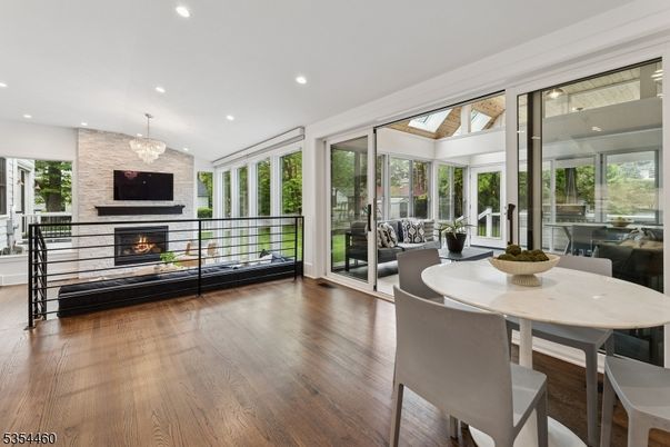 Chandelier, Dining room, Fireplace, Interior, Recessed Lighting, Wood Texture Flooring