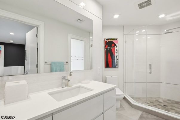 Bathroom, Dual Sink Vanities, Glass Shower, Interior, Recessed Lighting