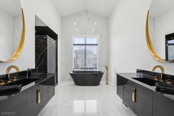 Bathroom, Dual Sink Vanities, Free Standing Baths, Interior, Marble, Marble Walls, Recessed Lighting