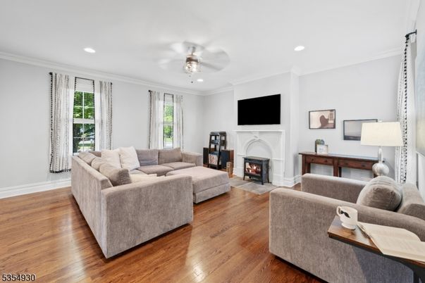 Fireplace, Interior, Living room, Recessed Lighting, Wood Texture Flooring