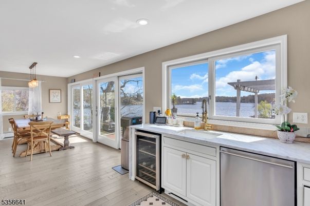 Dining room, Interior, Kitchen, Pendant Lights, Recessed Lighting, Water, Wood Texture Flooring