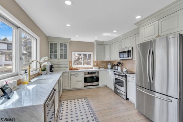 Interior, Kitchen, Recessed Lighting, Stainless Steel Appliances, Wood Texture Flooring