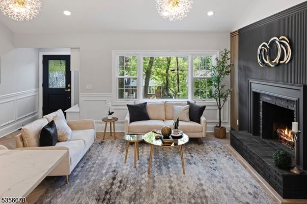 Chandelier, Fireplace, Interior, Living room, Recessed Lighting, Wood Texture Flooring