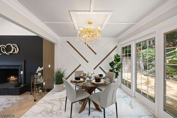 Chandelier, Dining room, Fireplace, Interior, Marble