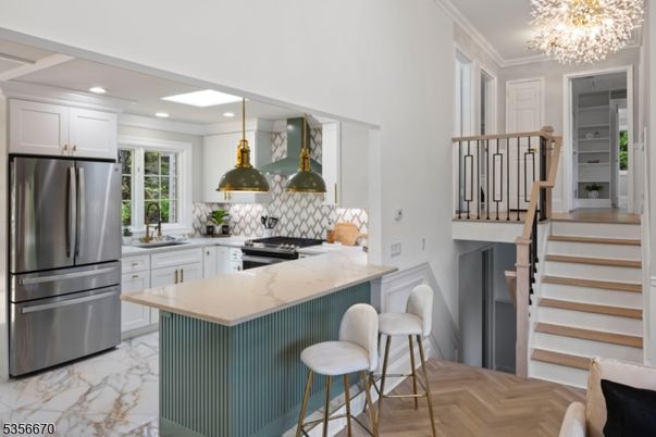Interior, Kitchen, Marble, Pendant Lights, Recessed Lighting, Stainless Steel Appliances, Wood Texture Flooring
