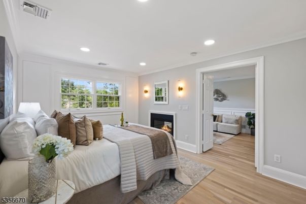 Bedroom, Fireplace, Interior, Recessed Lighting, Wood Texture Flooring