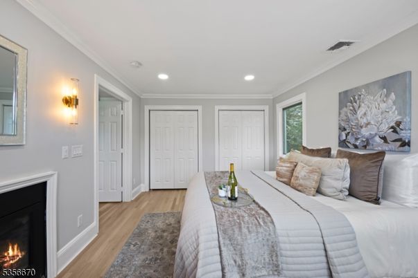 Bedroom, Fireplace, Interior, Recessed Lighting, Wood Texture Flooring