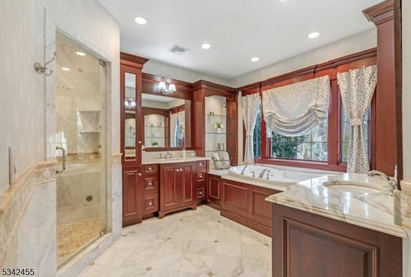 Bathroom, Dual Sink Vanities, Glass Shower, Interior, Marble, Recessed Lighting