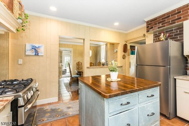 Interior, Kitchen, Recessed Lighting, Stainless Steel Appliances, Stone Walls
