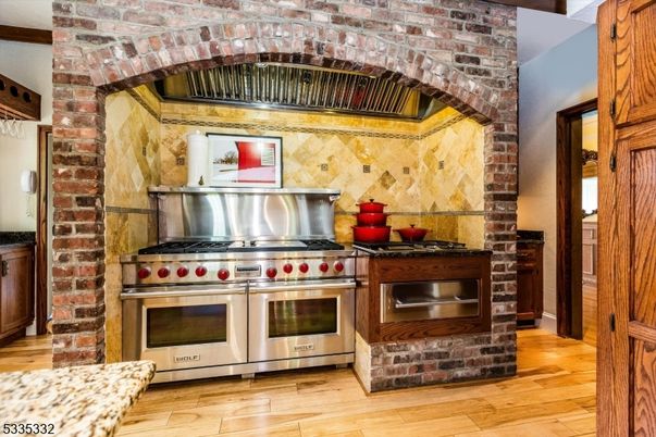 Interior, Kitchen, Stainless Steel Appliances, Stone Walls, Wood Texture Flooring