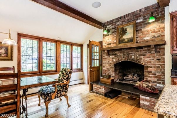 Dining room, Fireplace, Interior, Pendant Lights, Stone Walls, Wooden Beams, Wood Texture Flooring