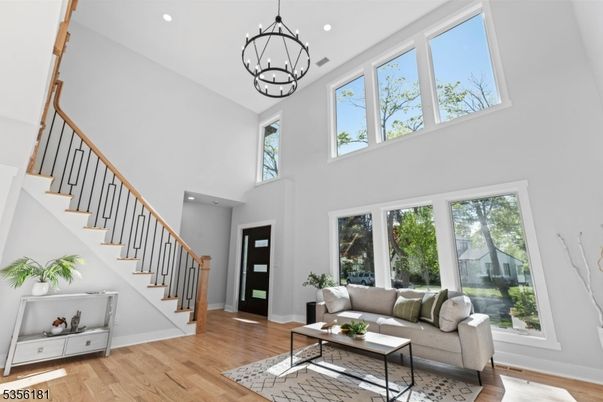 Chandelier, Interior, Living room, Recessed Lighting, Wood Texture Flooring