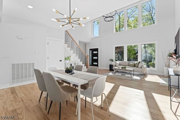 Dining room, Interior, Living room, Pendant Lights, Recessed Lighting, Wood Texture Flooring