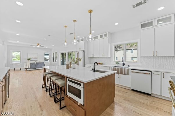 Interior, Kitchen, Living room, Pendant Lights, Recessed Lighting, Stainless Steel Appliances, Wood Texture Flooring