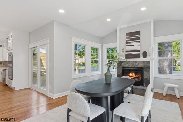 Dining room, Fireplace, Interior, Recessed Lighting, Wood Texture Flooring
