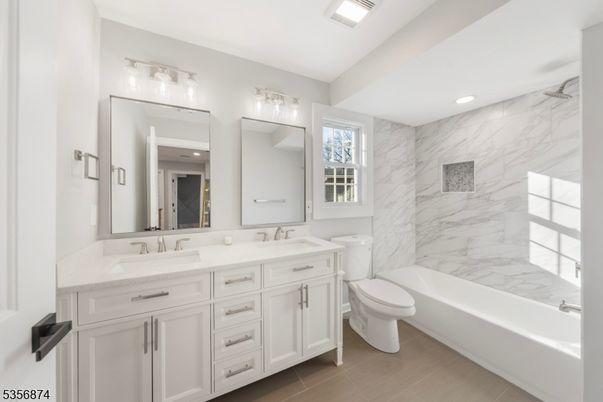 Bathroom, Dual Sink Vanities, Interior, Marble Walls, Recessed Lighting