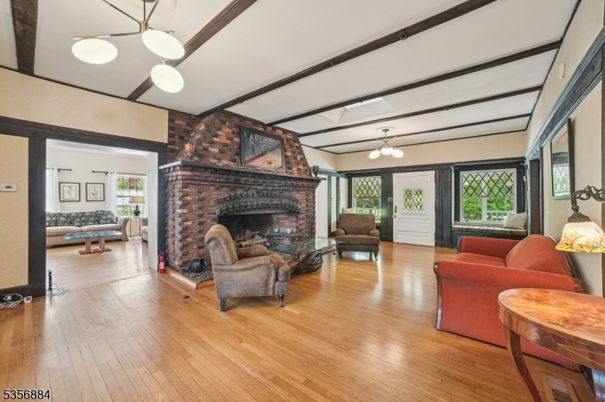 Fireplace, Interior, Living room, Pendant Lights, Stone Walls, Wood Texture Flooring