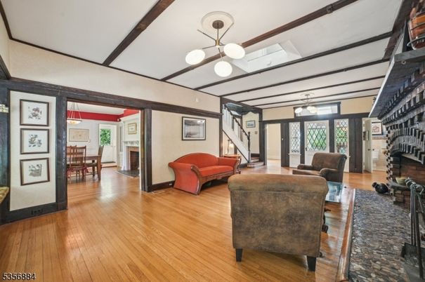Dining room, Fireplace, Interior, Living room, Pendant Lights, Wood Texture Flooring