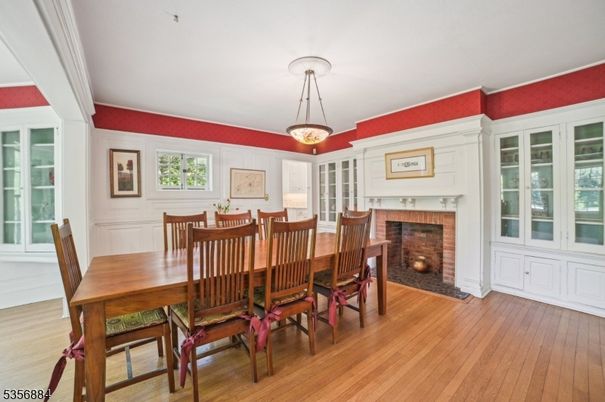 Dining room, Fireplace, Interior, Pendant Lights, Wood Texture Flooring