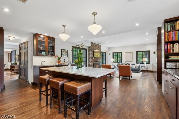 Dining room, Fireplace, Interior, Kitchen, Living room, Pendant Lights, Recessed Lighting, Wood Texture Flooring