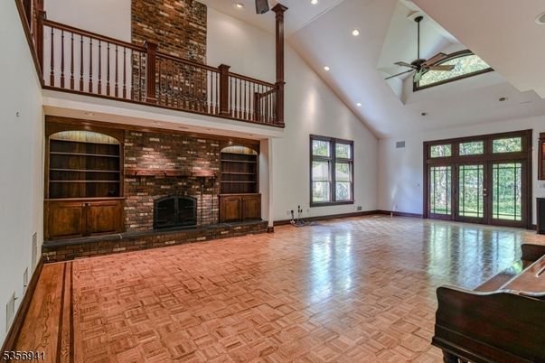Fireplace, Interior, Recessed Lighting, Stone Walls, Wood Texture Flooring