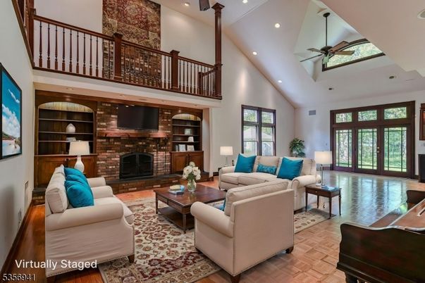 Fireplace, Interior, Living room, Piano, Recessed Lighting, Wood Texture Flooring