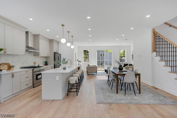Dining room, Interior, Kitchen, Living room, Pendant Lights, Recessed Lighting, Stainless Steel Appliances, Wood Texture Flooring