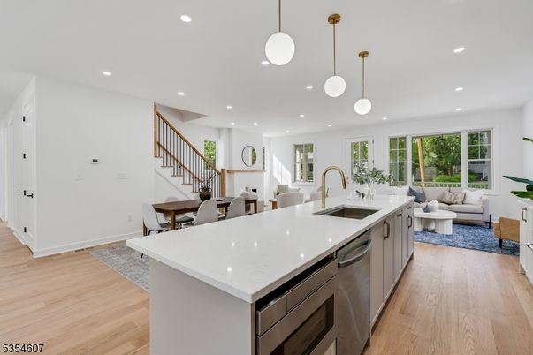 Dining room, Interior, Kitchen, Living room, Pendant Lights, Recessed Lighting, Stainless Steel Appliances, Wood Texture Flooring
