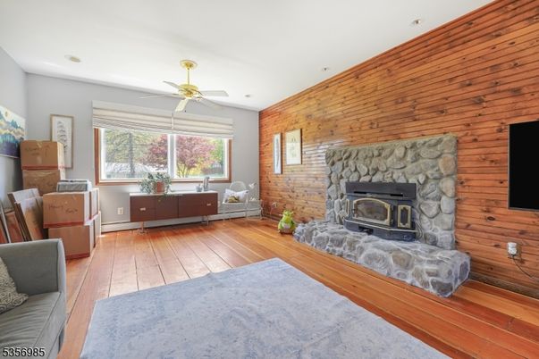 Fireplace, Interior, Recessed Lighting, Wood Texture Flooring, Wooden Walls