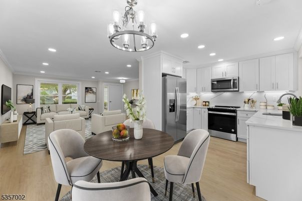 Chandelier, Dining room, Interior, Kitchen, Living room, Recessed Lighting, Stainless Steel Appliances, Wood Texture Flooring