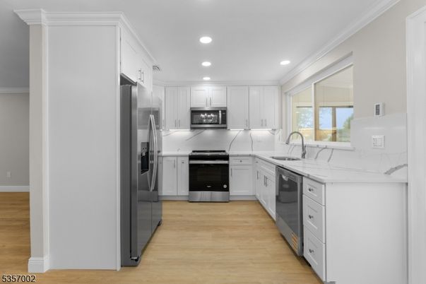 Interior, Kitchen, Recessed Lighting, Stainless Steel Appliances, Wood Texture Flooring