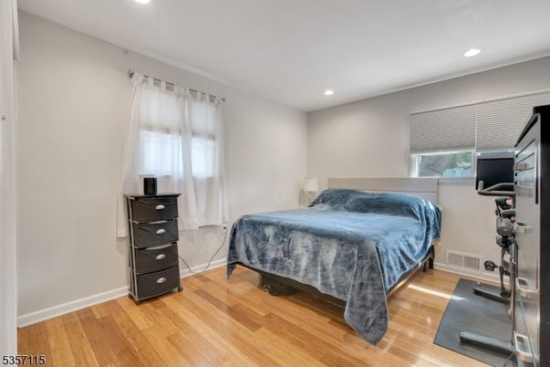 Bedroom, Fitness Equipment, Interior, Recessed Lighting, Wood Texture Flooring