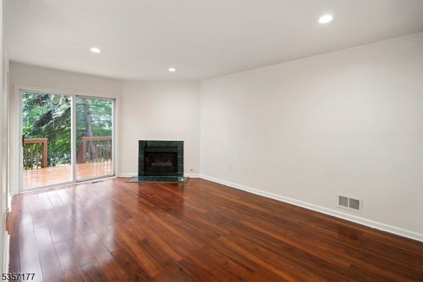 Empty room, Fireplace, Interior, Recessed Lighting, Wood Texture Flooring